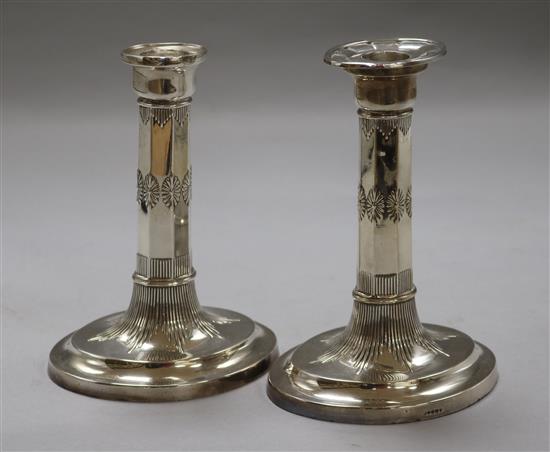 A pair of George III style plated candlesticks height 16cm